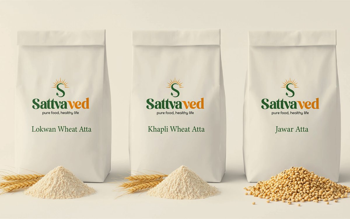 Sattvaved paper-packed atta — Lokwan Wheat, Khapli Wheat and Jawar Atta bags with fresh flour